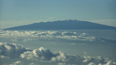 Haleakala National Park, Maui, Hawaii with clouds surrounding it.