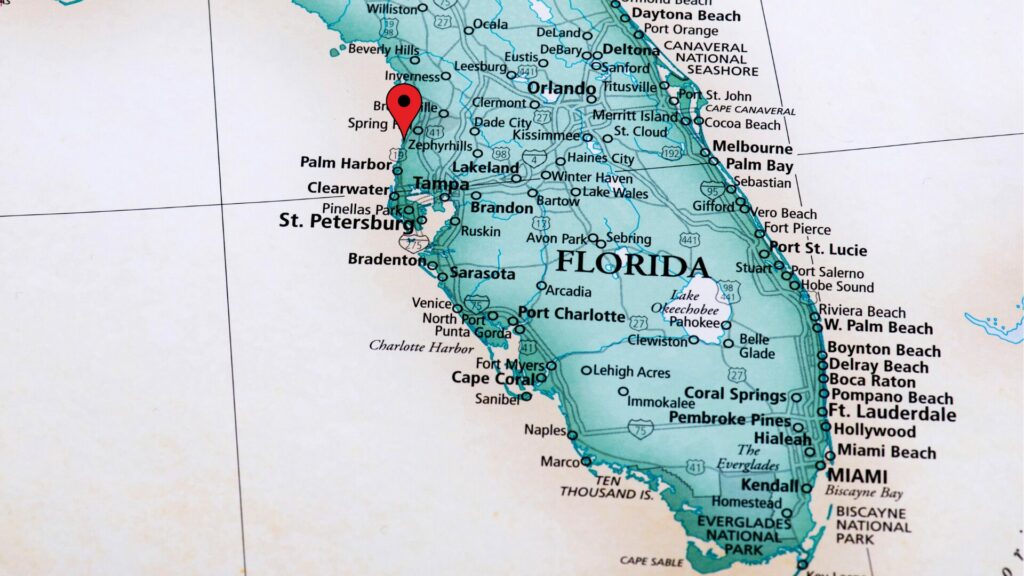 Map of Florida with Hudson, FL pinned with a red geographical pin. 