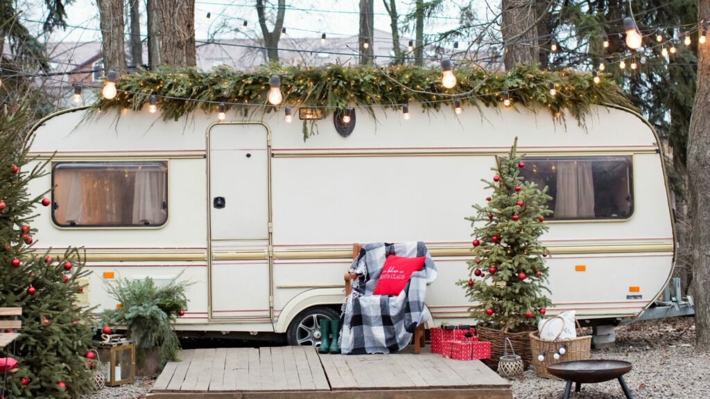 A holiday decorated travel trailer. 