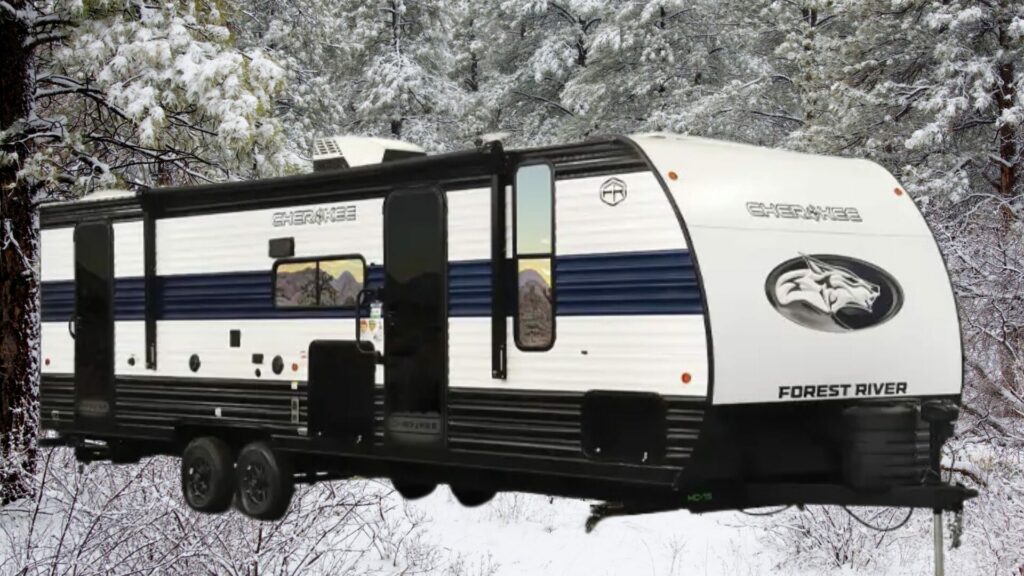 The Forest River Cherokee 294GEBG travel trailer for a family of five with a snowy background. 