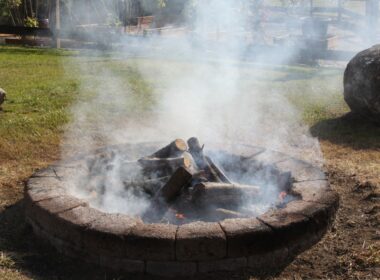 A photo of a smokey campfire.