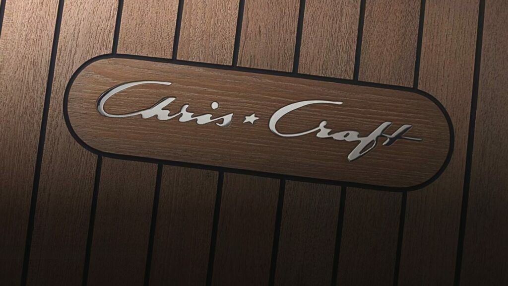 A close up of the Crhis Craft logo in the wood planks of a boat. 