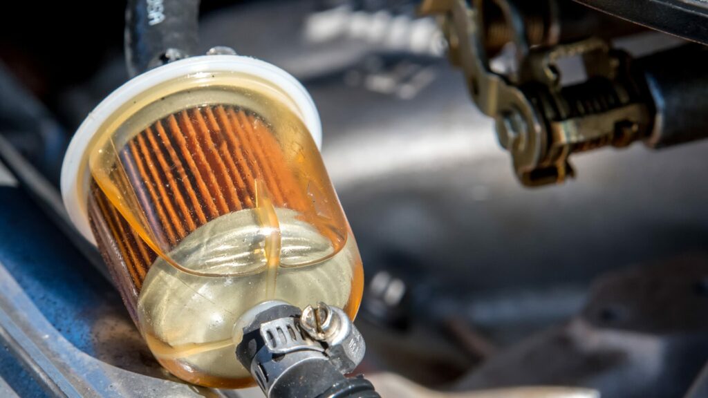 A close up of the fuel filter of an automobile. 