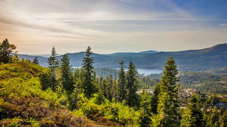 A scenic view of the lake at Snowflower Thousand Trails RV Resort.