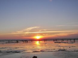 Sunset sky over a beach at the oceanfront access at the Thousand Trails Oceana RV Resort.